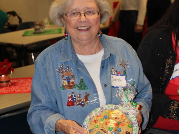 Brenda Scheatzle with her Bake Sale Purchase